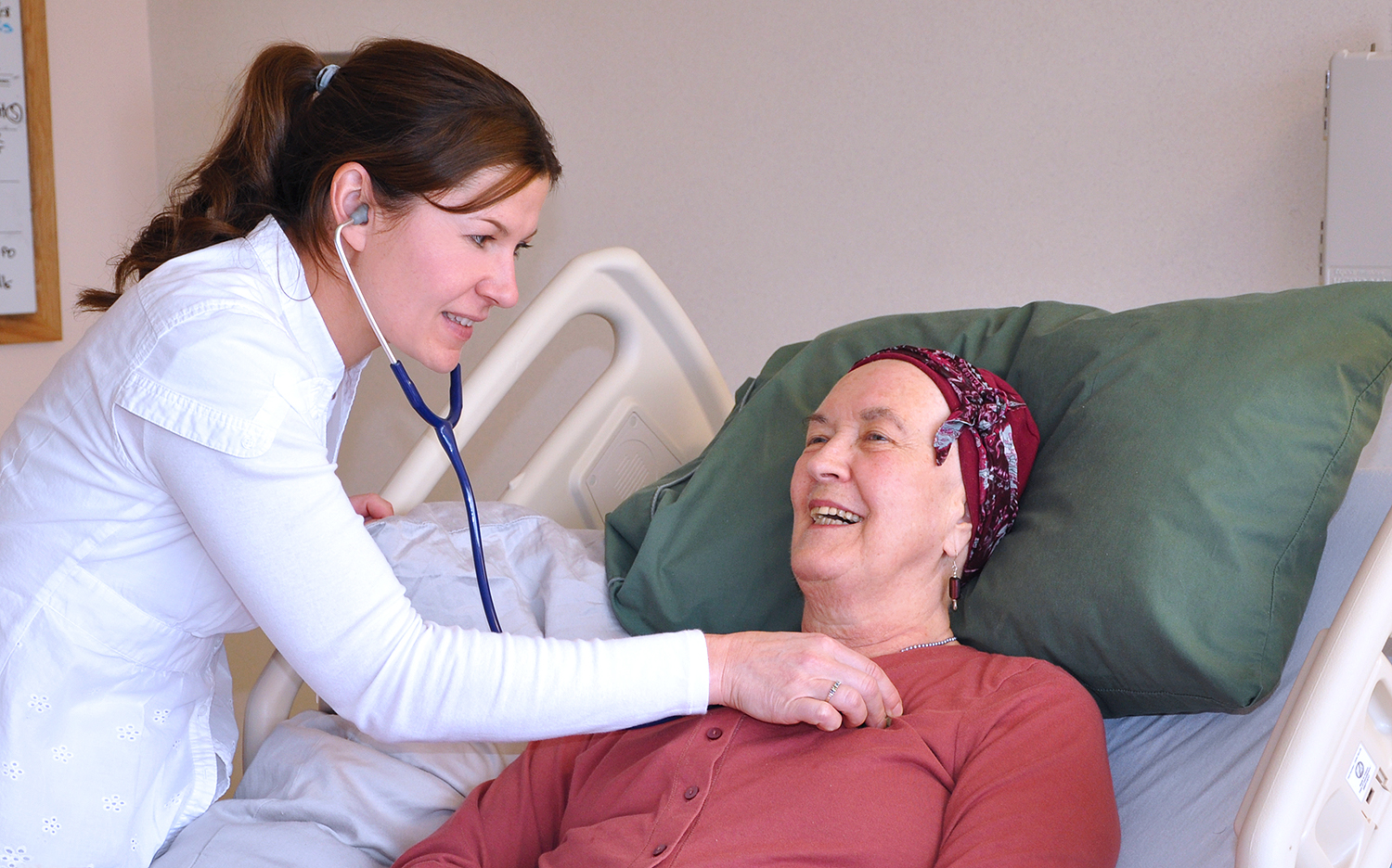 Occupational Therapy (OT) nurse helping patient at Whittier Rehabilitation Hospital in Massachusetts